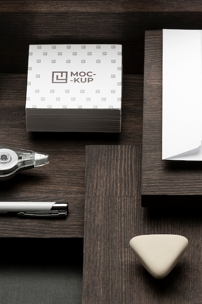 Arrangement of mock-up stationery on wood