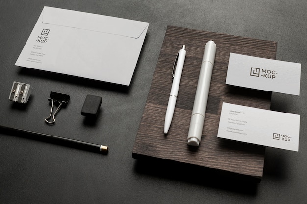 PSD arrangement of mock-up stationery on wood