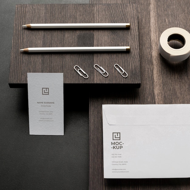 PSD arrangement of mock-up stationery on wood