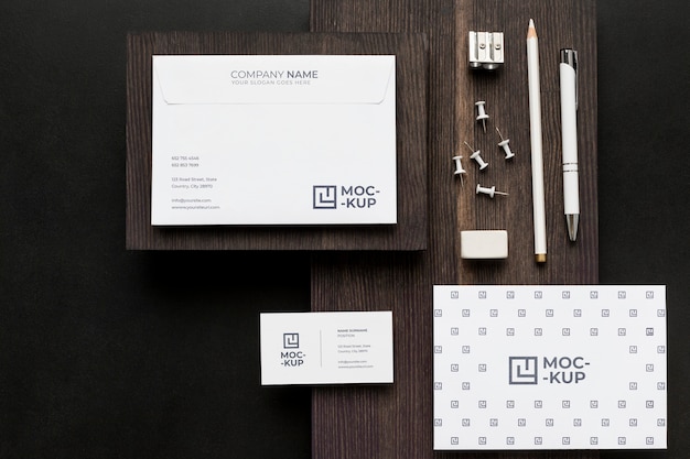 PSD arrangement of mock-up stationery on wood