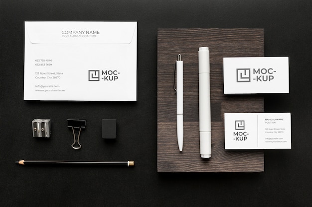 Arrangement of mock-up stationery on wood