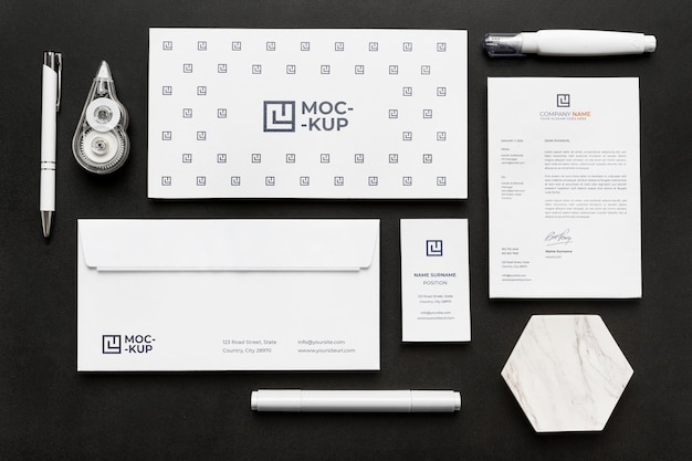 PSD arrangement of mock-up stationery on wood