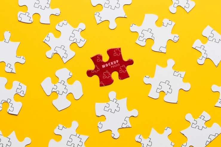 PSD arrangement with puzzle pieces on yellow background