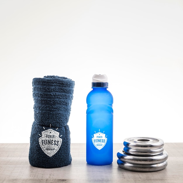 Arrangement with water bottle and towel