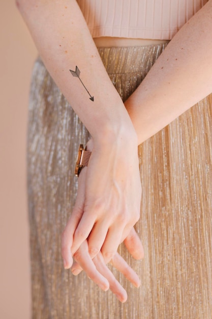 arrow tattoo on woman39s wrist