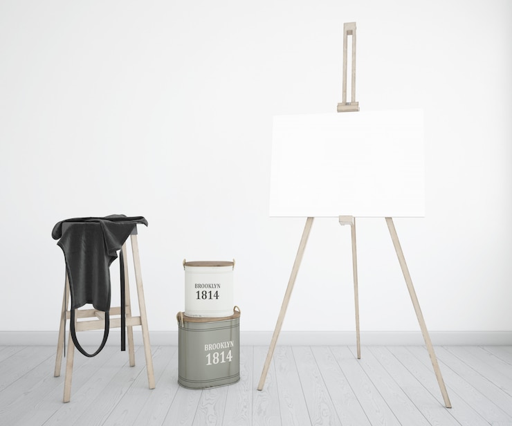 PSD art studio with canvas, apron and paint bottles