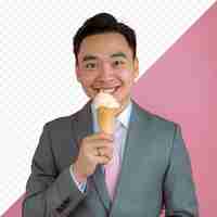 PSD asian man in a suit eating ice cream in a cone on a pink isolated background business finance