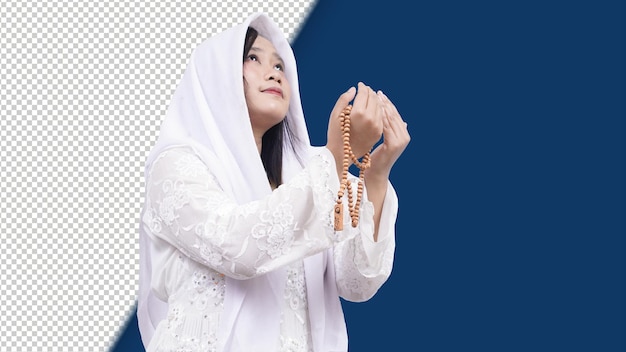 asian muslim woman wearing prayer beads pray in white background