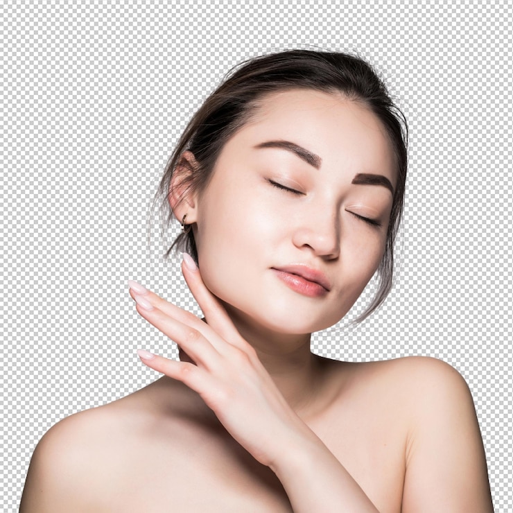 PSD アジア人女性の美顔クローズアップポートレート 美しい魅力的な混血アジア人女性モデル 完璧な肌で灰色の壁に隔離されています