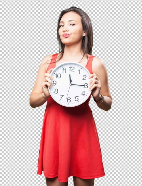 Asian woman holding a clock