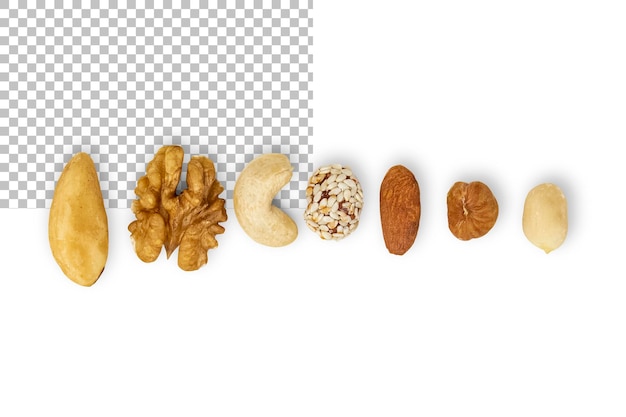 PSD assorted nuts lying in a row isolated on transparent background