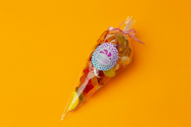 Assortment of candy in tied plastic bag