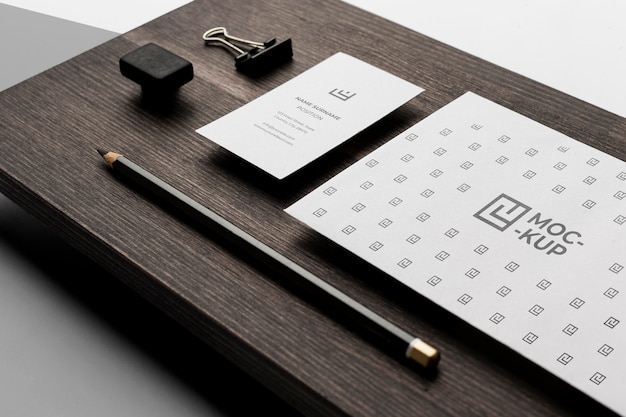 PSD assortment of mock-up stationery on wood