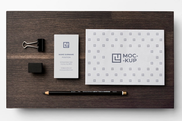 PSD assortment of mock-up stationery on wood