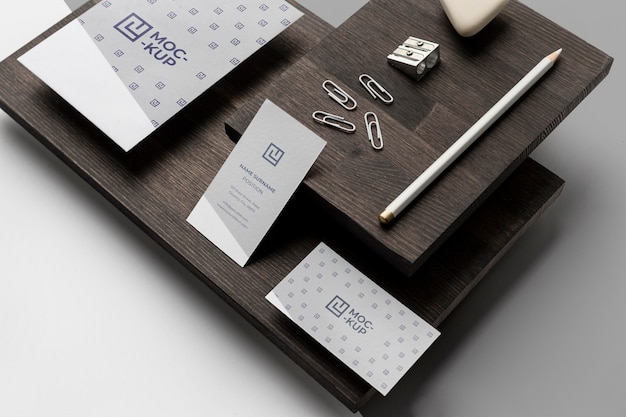 Assortment of mock-up stationery on wood