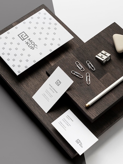 Assortment of mock-up stationery on wood