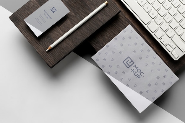 assortment of mock-up stationery on wood
