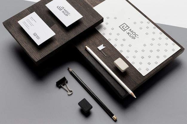 Assortment of mock-up stationery on wood