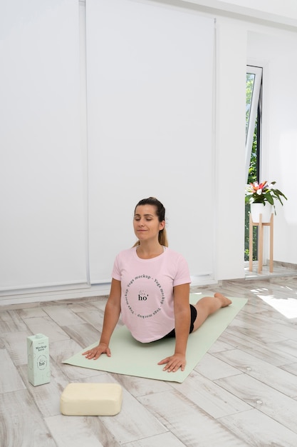 PSD athletic woman doing yoga at home