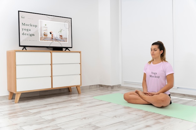 PSD athletic woman doing yoga at home