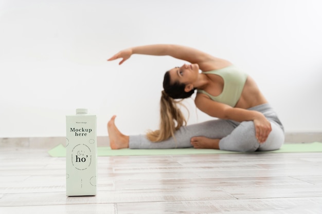 PSD athletic woman doing yoga at home