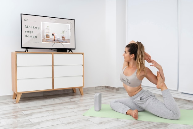 PSD athletic woman doing yoga at home