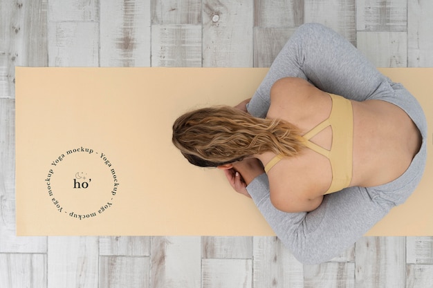 Athletic woman doing yoga at home