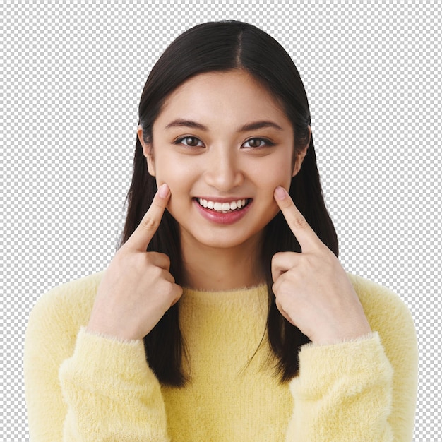 검은 짧은 머리카락을 가진 매력적인 웃는 여성은 <unk>을 가리키고 미소 짓고 피부 관리 제품이나 화장품을 사용하도록 권장합니다.