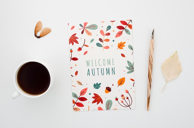 autumn card next to card and coffee