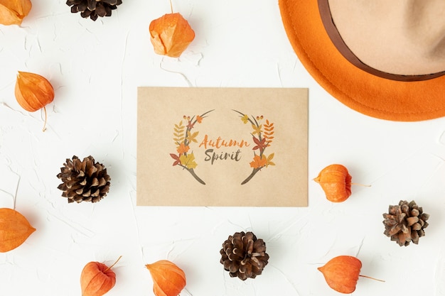 Autumn spirit card surrounded by leaves and pine cone