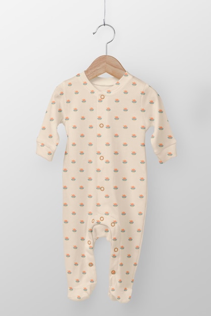 Baby pajamas mockup kids apparel in beige cute patterned design psd