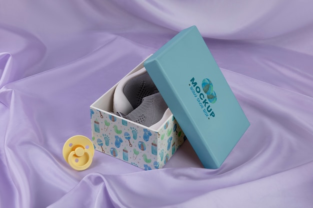 PSD baby shoes with blue box
