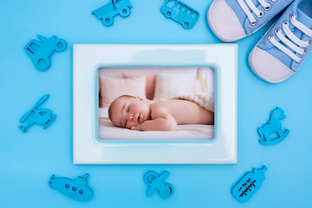 baby shower decorations with frame and shoes