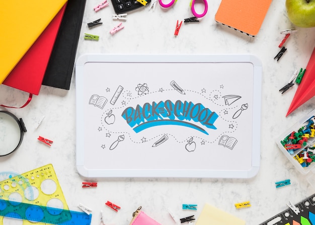 back to school event with supplies and white board