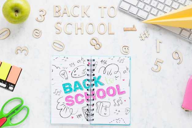 back to school items with white keyboard
