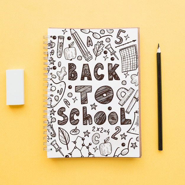 Back to school mockup with notebook cover