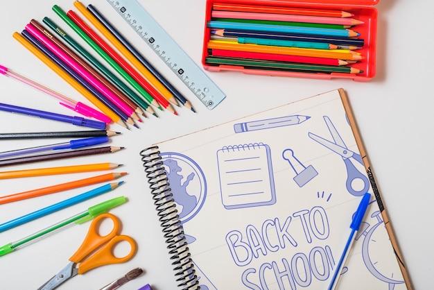 PSD back to school mockup with notebook and pencils