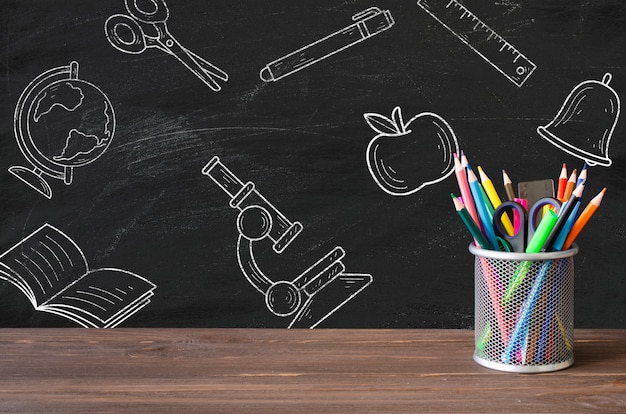 PSD back to school supplies on blackboard mockup