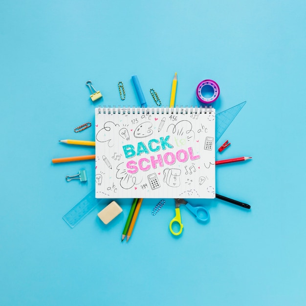 Back to school supplies with notebook and drawing