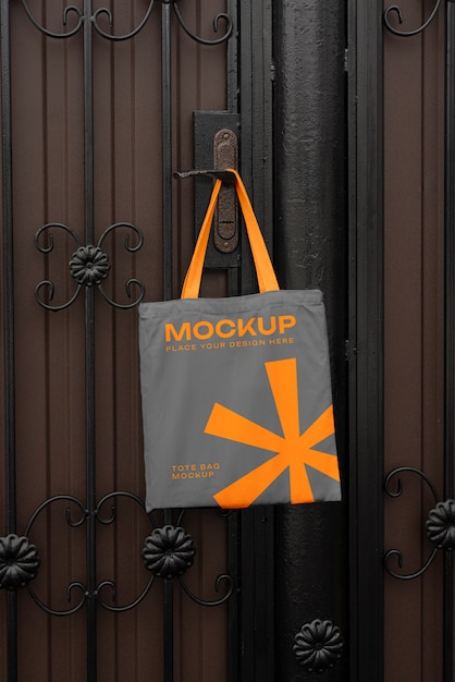 PSD bag mockup hung on door