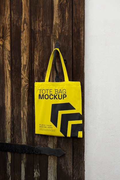 PSD bag mockup hung on door