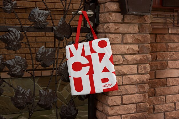 PSD bag mockup hung on door