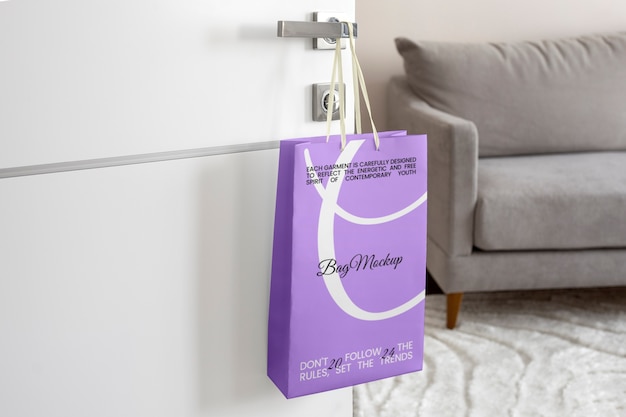 PSD bag mockup hung on door