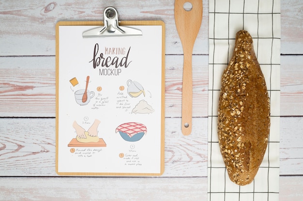 Bakery recipe on clipboard on desk