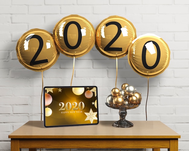 PSD balloons with new year number and tablet