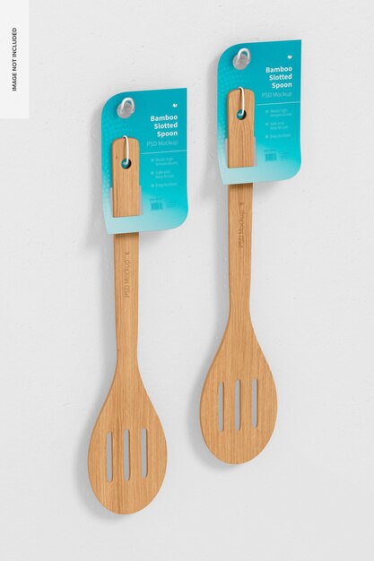 PSD bamboo slotted spoons mockup, hanging on wall