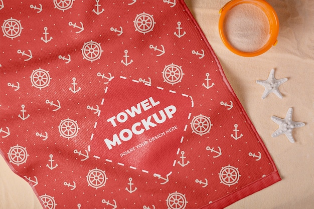 Beach towel mock-up with sand