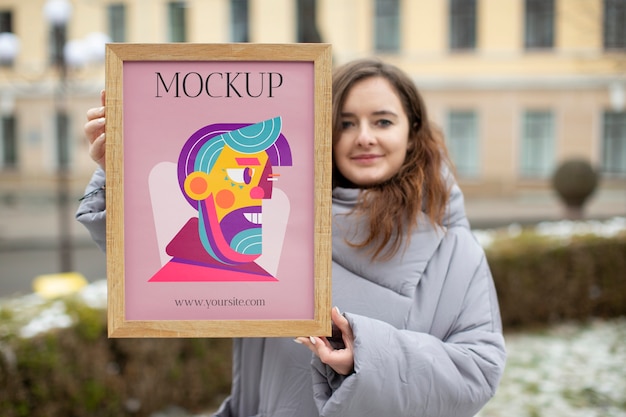 beautiful frame model mockup held by girl