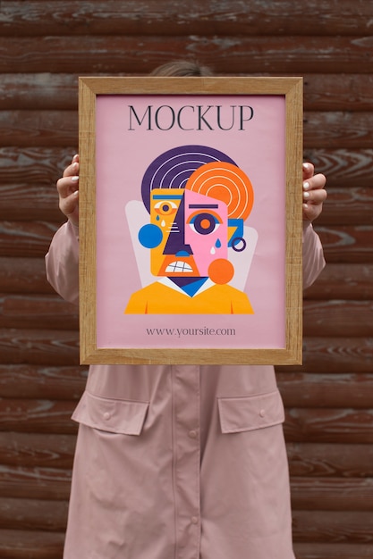 Beautiful frame model mockup held by girl