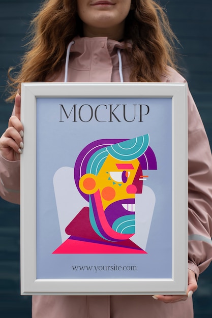 PSD beautiful frame model mockup held by girl